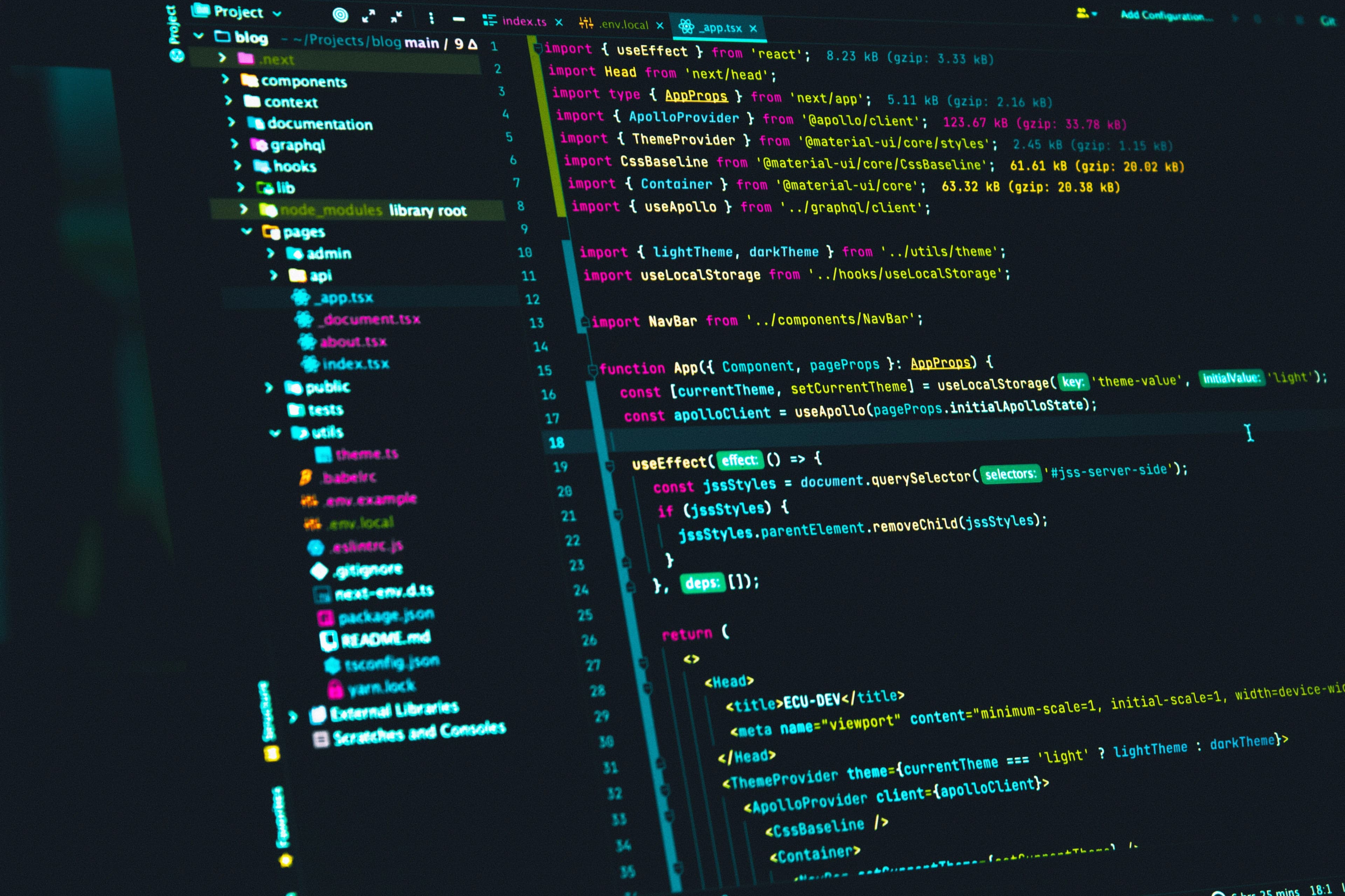 Close-up of a computer screen displaying colorful code lines in a text editor, with a sidebar listing project files and folders.